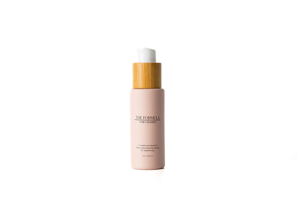 A bottle of the formula for cramps, a topical cream to alleviate menstrual cramps